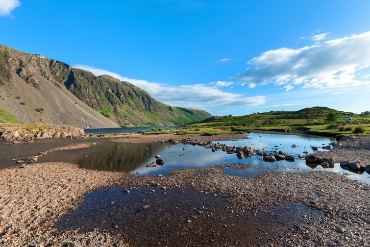 Have fun playing on the shallow shores of Wastwater Lake