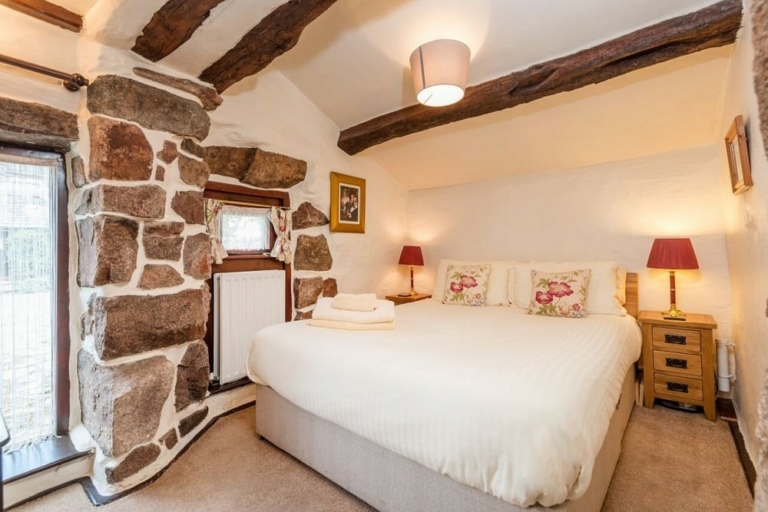 Historic character stonework in the bedroom