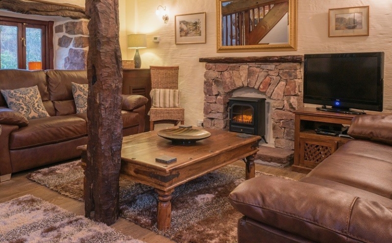 Scafell's light and airy open plan living area beneath the beams