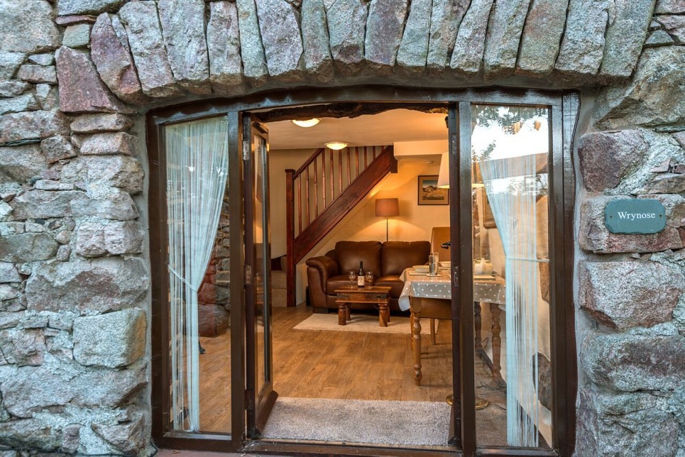 Wrynose cute and cosy entrance behind our 3ft thick pink granite stone walls
